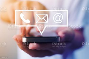 photo of phone with telephone, email and web icons